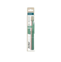Medium toothbrush 2-pack: green handles, white bristles, Jordan Green Clean.