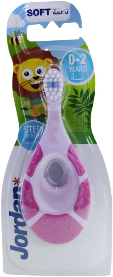Jordan pink infant toothbrush package for 0 to 2 years with ergonomic grip and animal design soft bristle toothbrush for infants