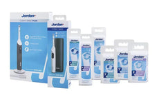 Set of Jordan whitening brush head packages with white handles and blue bristle heads