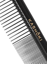 Kashoki hair cutting comb close-up with fine metal teeth and black base