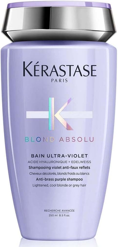 Kerastase Blonde Absolu shampoo in a purple bottle for lightened, blonde, or gray hair care
