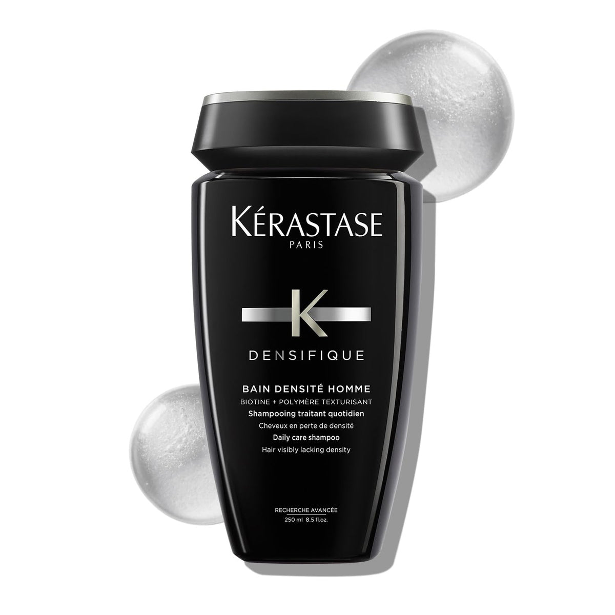 Kérastase densifique shampoo for men in a sleek black bottle for daily hair care and increased density