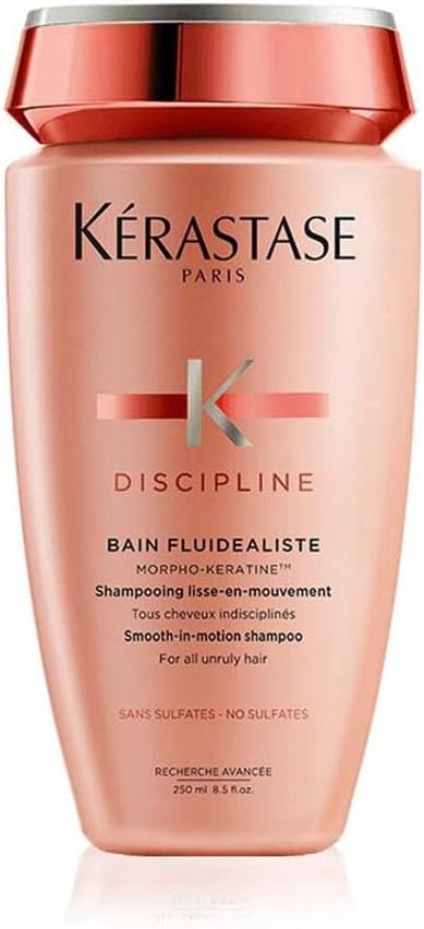 Kérastase Discipline sulfate-free shampoo in a pink bottle for smooth, unmanageable hair care