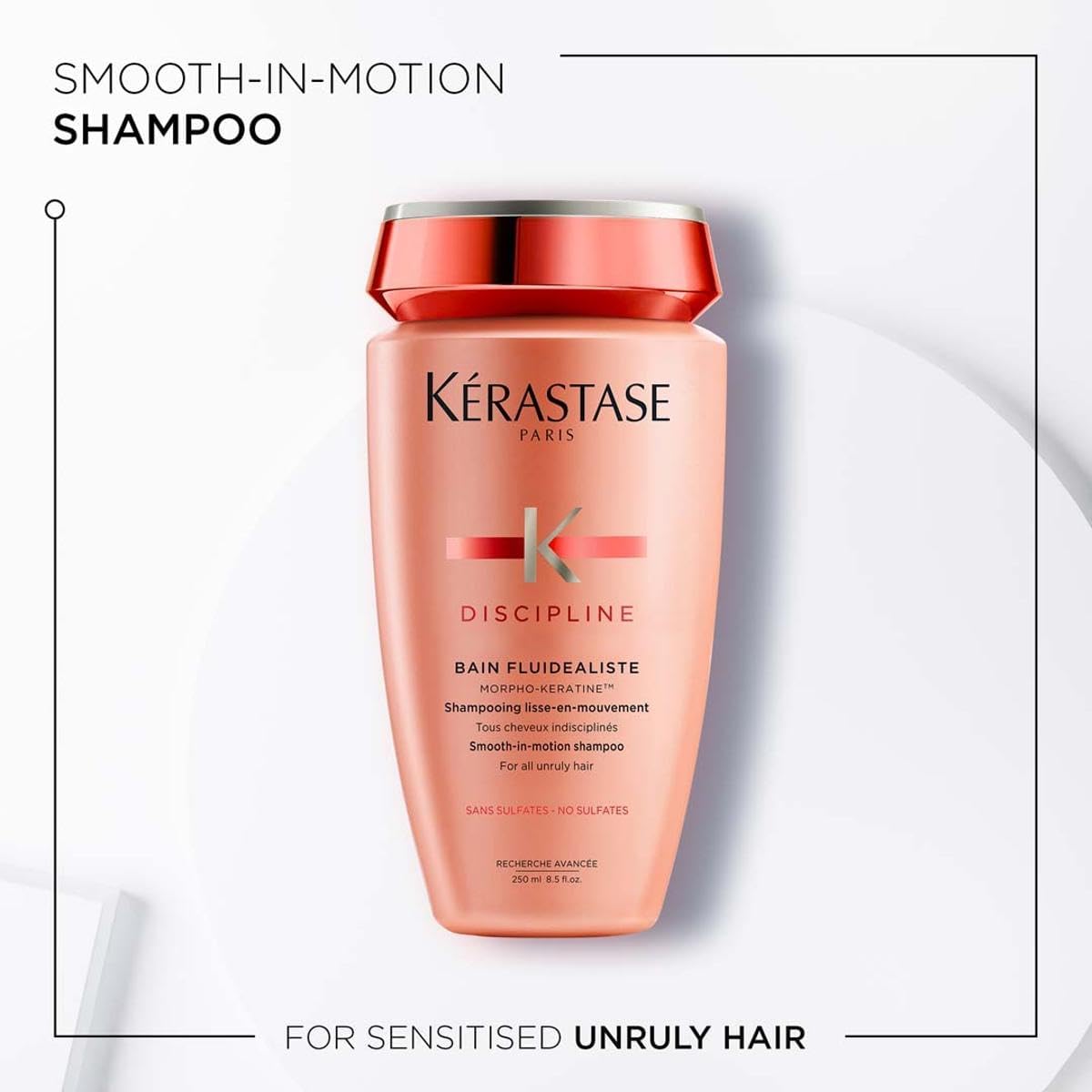 Kérastase Discipline sulfate-free shampoo in a pink bottle for smooth, manageable hair