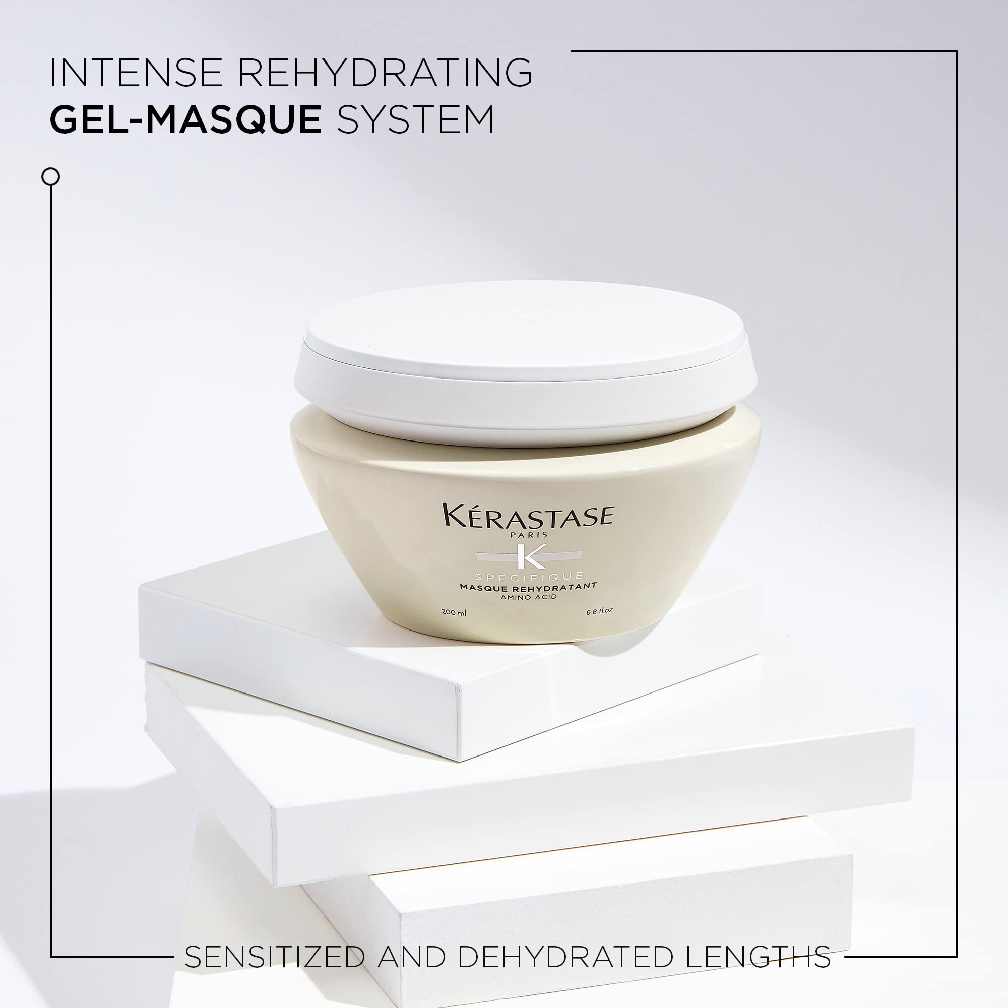 Kerastase hydrating hair mask in a cream jar, perfect for sensitized and dehydrated hair.