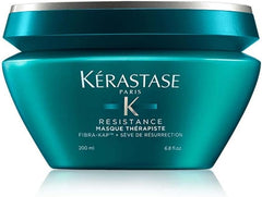 Kérastase Resistance hair mask in a turquoise jar for repairing damaged hair