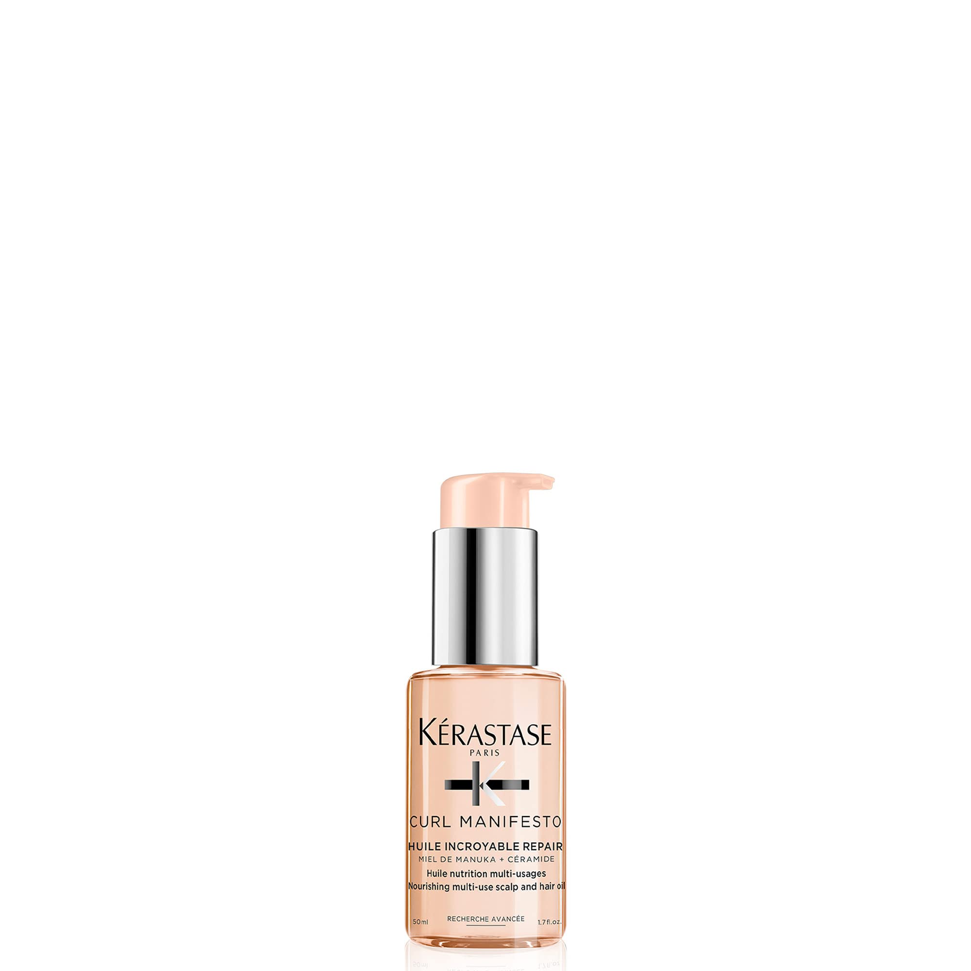 Kerastase Sublime Repair Oil for hair in a sleek bottle with a pump dispenser for easy use