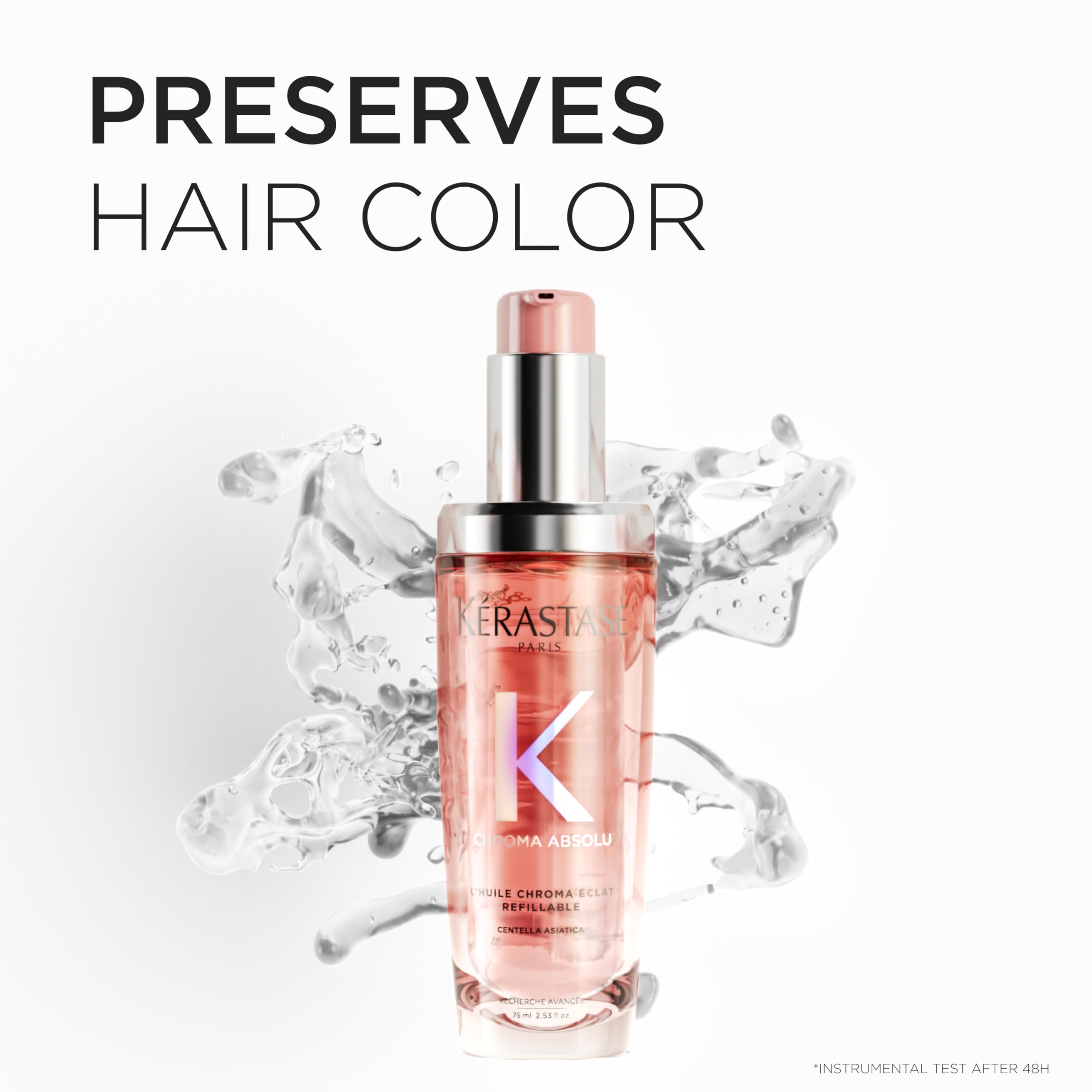 Kerastase refillable hair oil in a sleek bottle with a pink cap, designed to preserve hair color.