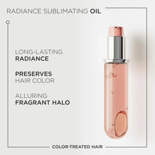 Refillable hair oil bottle with rose-pink liquid and silver pump top, label panel