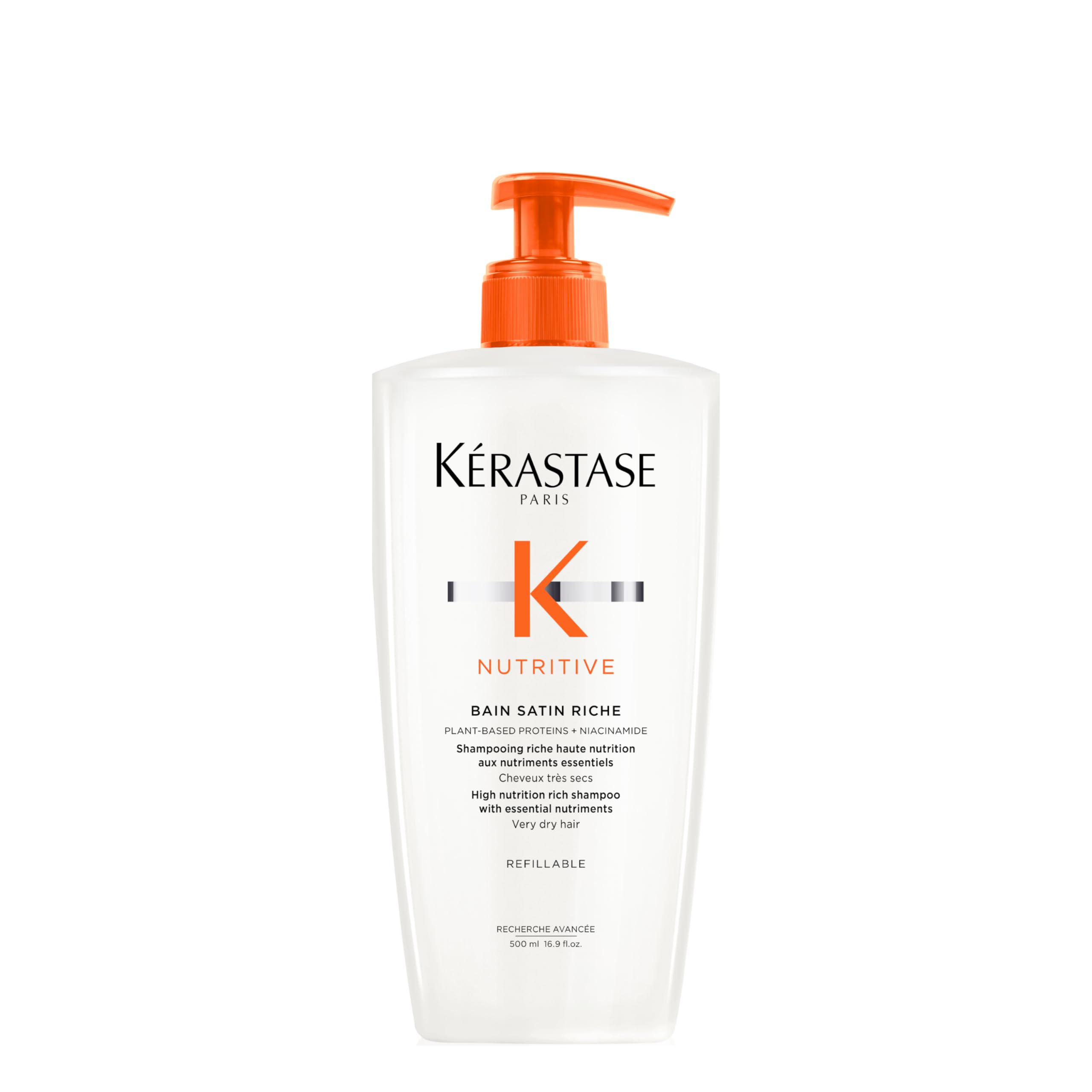 Kerastase shampoo for very dry hair in a sleek bottle with an orange pump for easy dispensing.