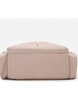 Large capacity baby travel bag, light khaki, side view with main zip compartment