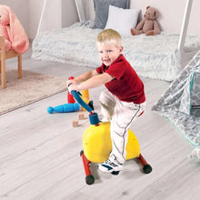 Kids aerobic stepper with yellow rider ball, red frame, and blue foot pedals