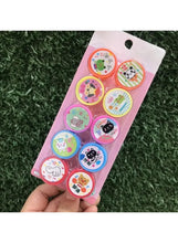 Kids cartoon stamp set with 10 colorful circular stamp heads on pink card