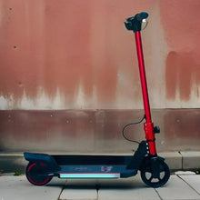 Red and black electric kids scooter with blue deck and visible wheels