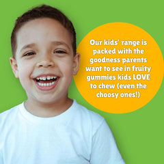 Smiling young boy beside yellow text bubble promoting chewy vites immune vitamins for children fruity gummies