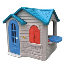 Kids plastic playhouse with blue roof, gray walls, blue door, red double doors, windows