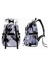 Rolling backpack with black and white splatter print, side view with straps and wheels