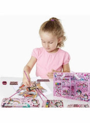 Girl using Huitich kids stationery kit pink with coloring supplies and unicorn-themed items