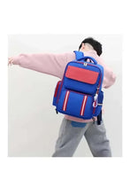 Blue kids trolley backpack with red front flap, side pocket and carry handle