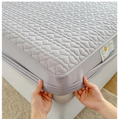 Huitich king size waterproof mattress topper fitted sheet with quilted heart pattern being placed on mattress
