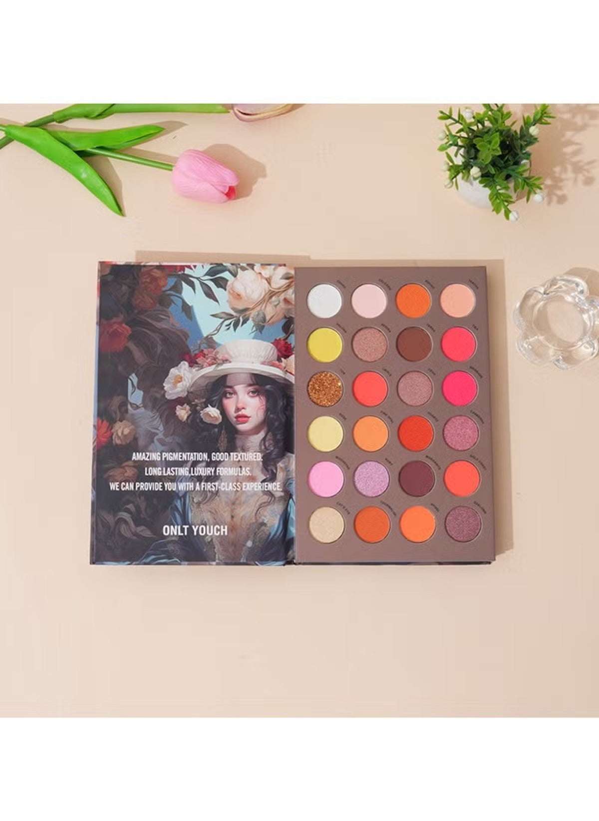 Huitich book style eyeshadow palette with 24 vibrant and neutral shades in a floral cover design