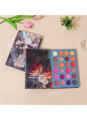 Huitich book style eyeshadow palette with 25 vibrant shades including matte and shimmer colors