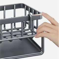 Huitich stainless steel sink organizer with sturdy metal frame and drainage tray held by hand
