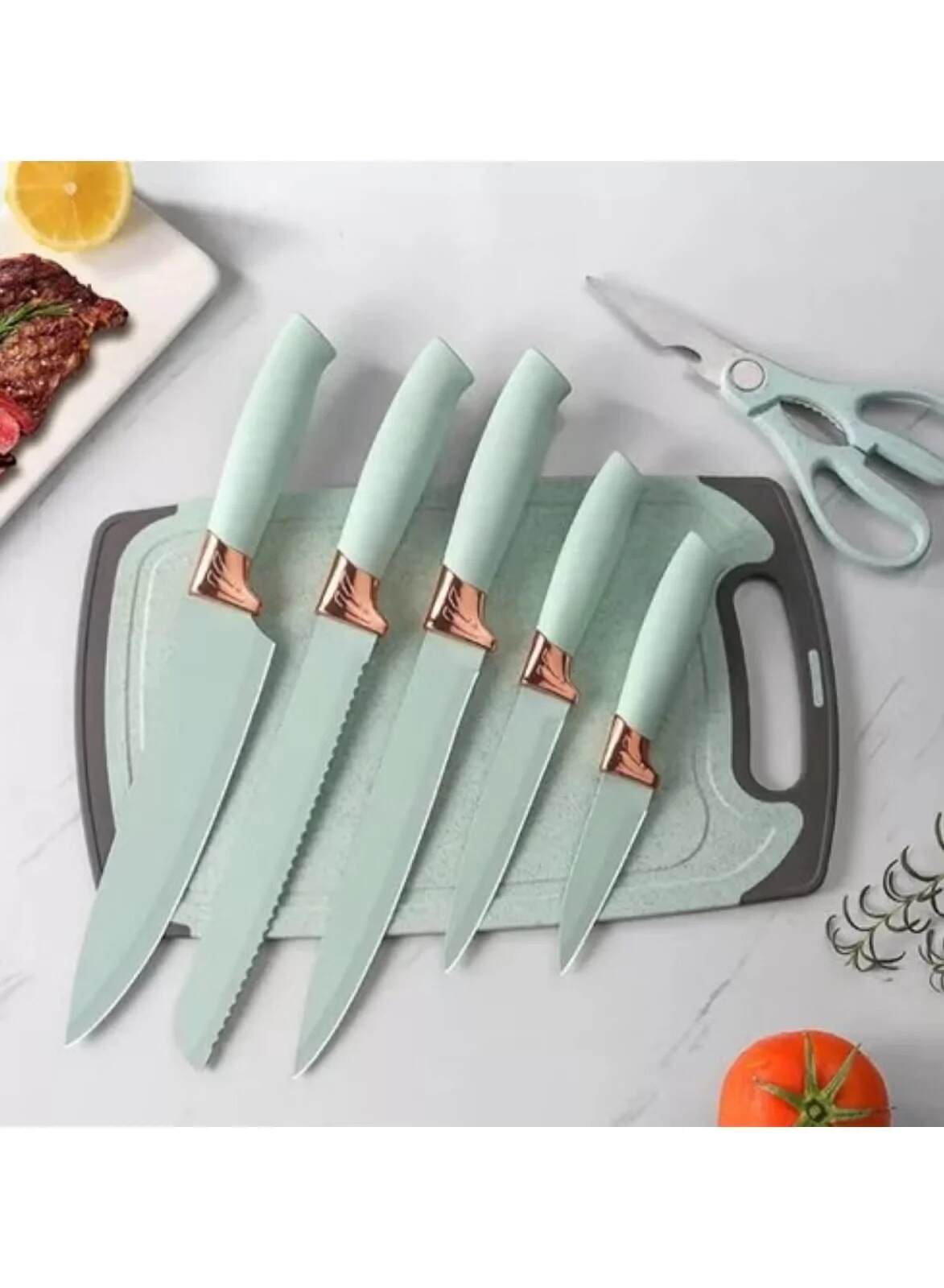 Huitich kitchen utensil set for modern home chefs with five knives and kitchen shears on cutting board