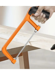 Orange-and-black staple remover tool pulling staples
