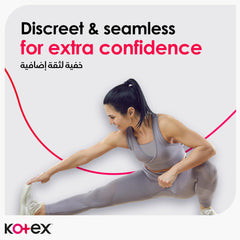Kotex ad showing a woman stretching promoting ultra thin sanitary pads with wings discreet seamless comfort