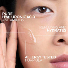 Face with hyalu B5 serum applied in a thick line and dropper held near skin
