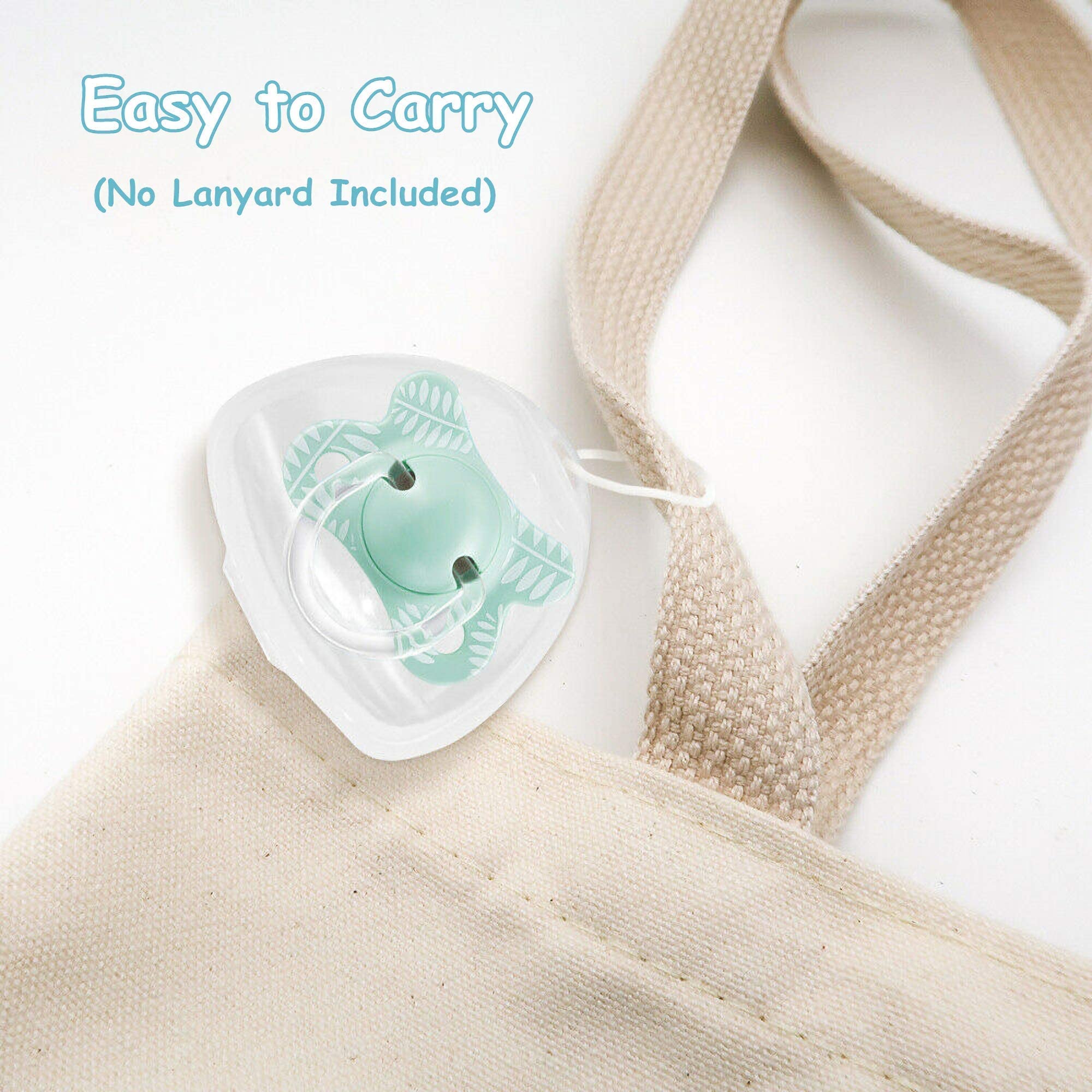 LODROC pacifier holder case with translucent shell and green pacifier sitting on beige tote strap
