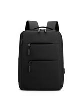 Black large school backpack with front zip pockets and padded shoulder straps