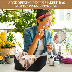 Large capacity travel cosmetic bag by SFXULIX open on table with makeup inside and woman applying makeup nearby