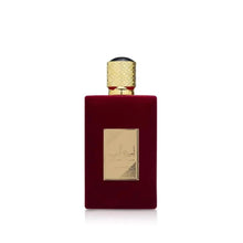 Burgundy perfume bottle with gold cap and square gold-trim label