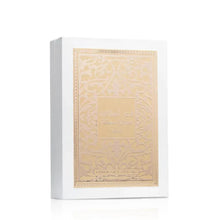Perfume gift box with ornate gold panel and embossed script on the front