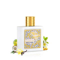 Lattafa Qaed al Fursan Unlimited perfume white bottle with gold cap surrounded by tropical fruits and flowers