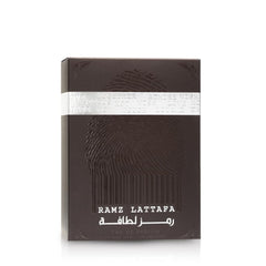 Lattafa Ramz Silver perfume black box with fingerprint design and silver band packaging