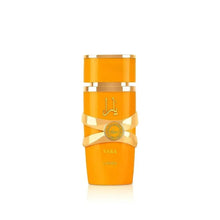 Lattafa Yara Tous women's orange perfume bottle with gold cap and band