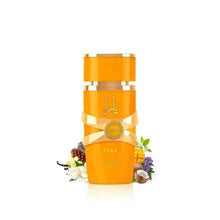 Lattafa Yara Tous women's orange perfume bottle with gold top