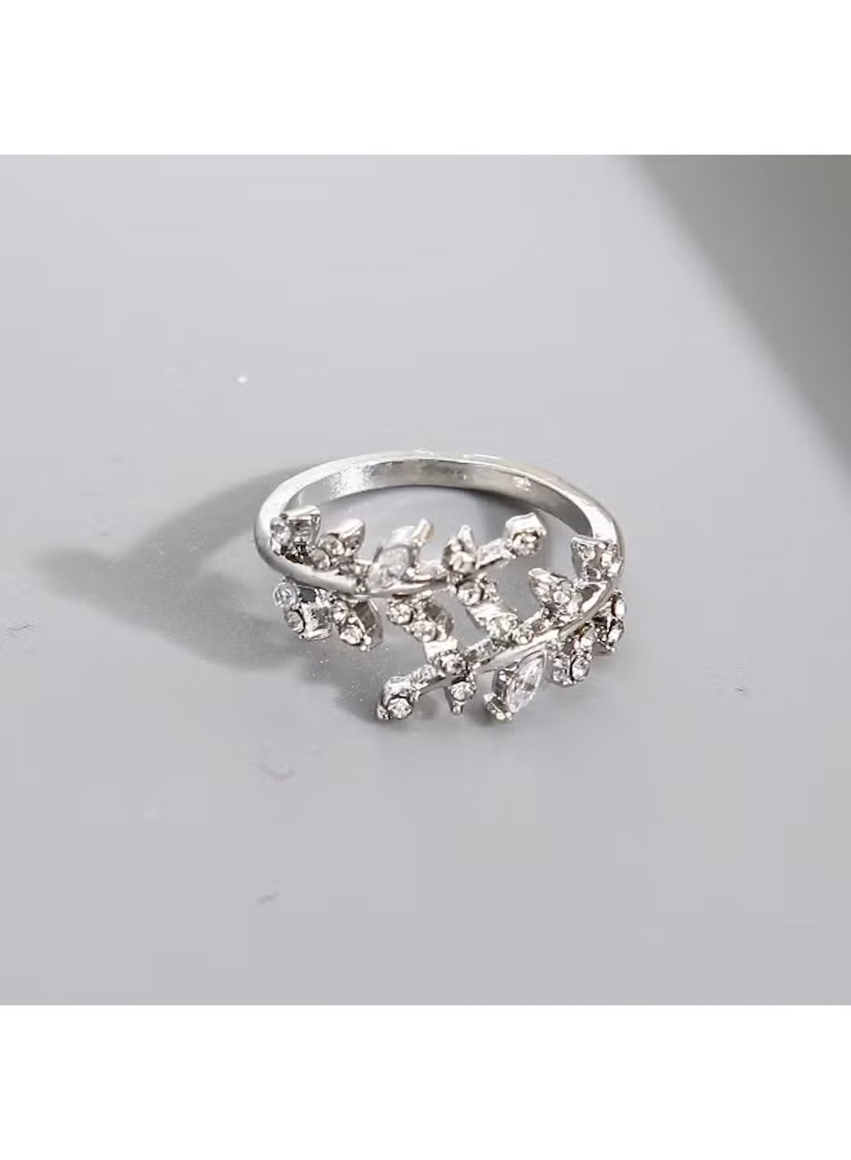 Leaf design silver ring for women featuring sparkling embellishments for a unique look