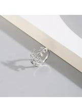 Silver-tone leaf branch ring with clear rhinestones, slim round band