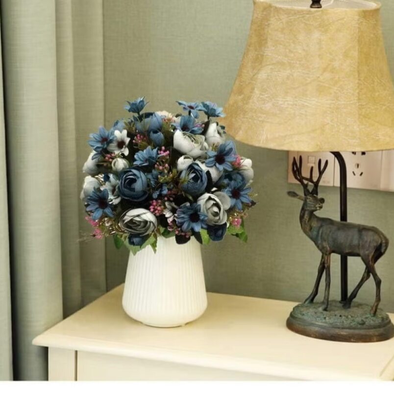 Huitich light blue artificial flower bouquet with peony flowers in white vase on table next to deer lamp