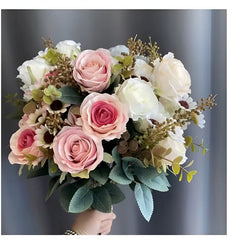 Light coffee faux roses for weddings bouquet with mix of white and pink artificial flowers and green leaves