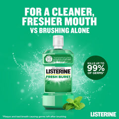 Green bottle of Listerine Fresh Burst mouthwash with mint leaves on green background claiming kills up to 99 percent of germs