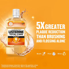 Bottle of Listerine Total Care mouthwash UAE on orange background with splash and 5X plaque reduction claim