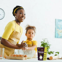Woman preparing food with a monk fruit sweetener pouch on the counter