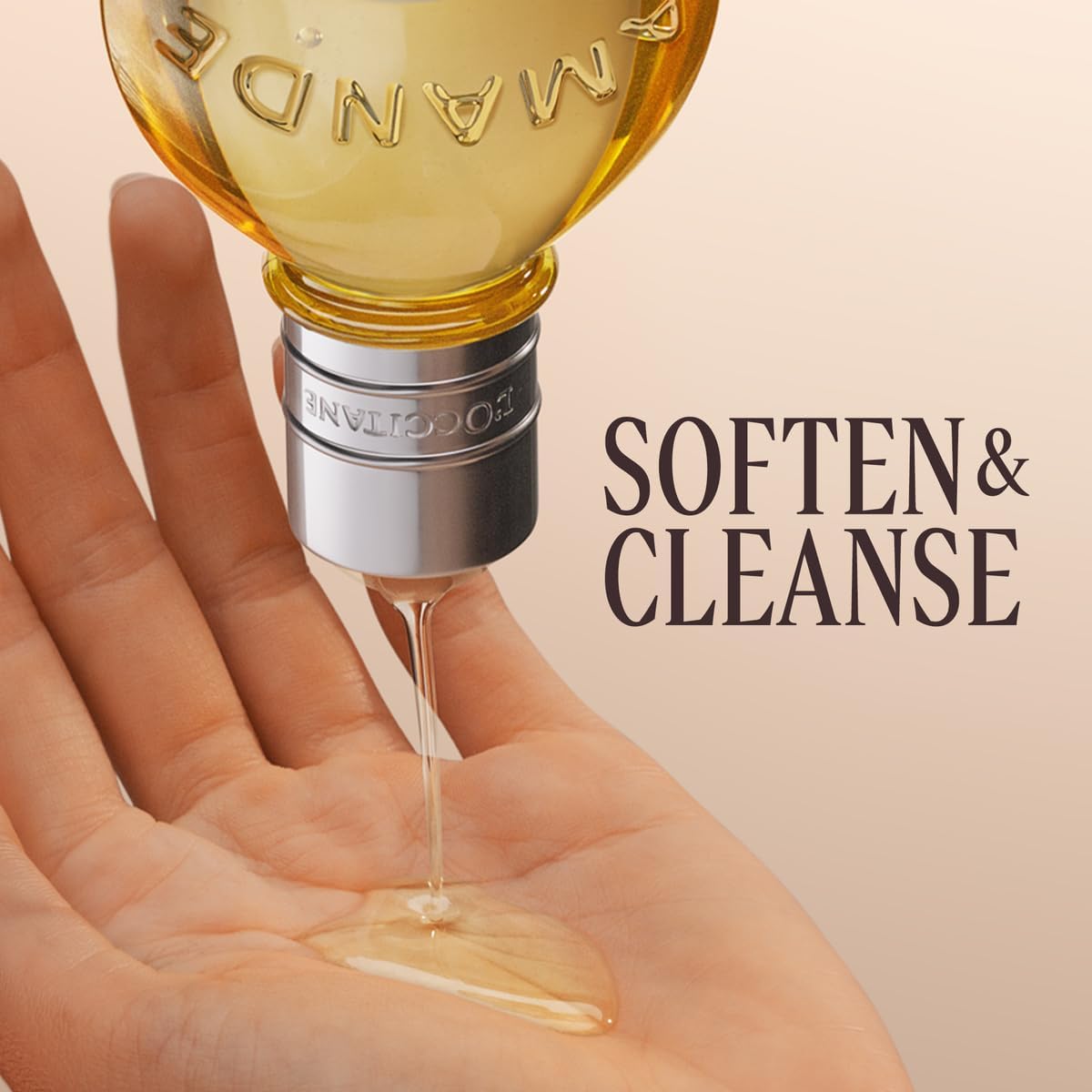 L'Occitane cleansing oil pouring from a bottle onto a hand for softening and cleansing skincare