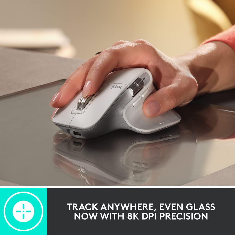 Logitech ergonomic mouse for productivity with 8K DPI precision used on glass surface