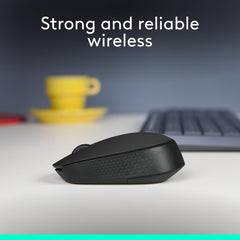 Logitech M171 wireless mouse in black shown on desk with keyboard and coffee cup in background